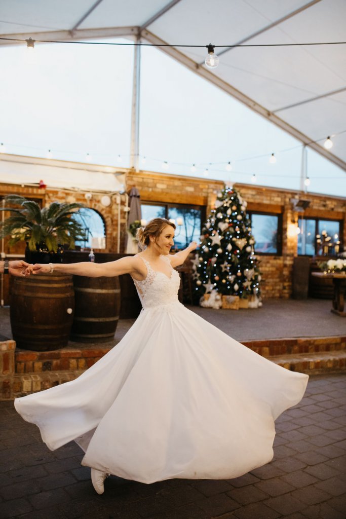 Real Bride Emma wearing her Custom Harriett Falvey Wedding Dress and Veil Made in New Zealand